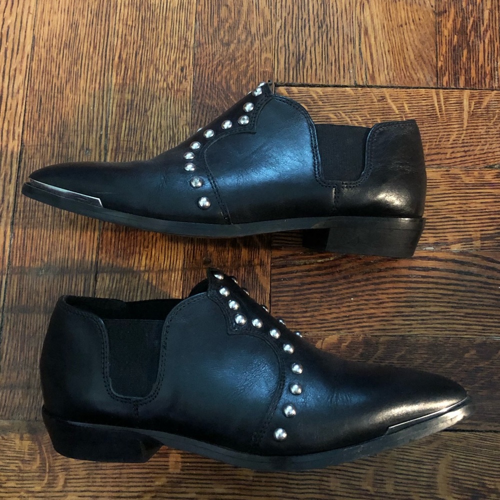 Diesel pointed toe studded leather boots.